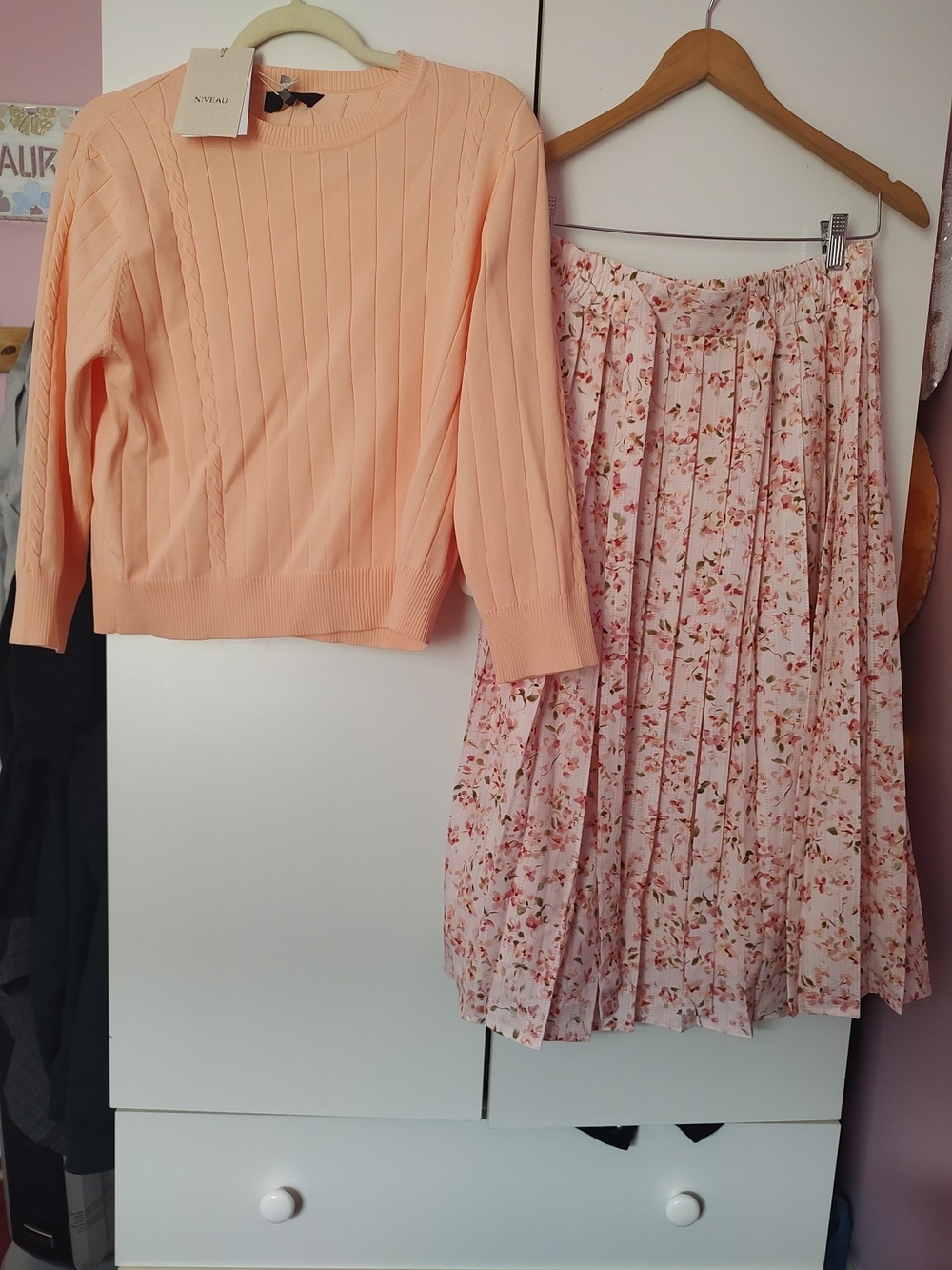 Lilac Clothing Peach Ribbed Sweater with Pink Floral Pleated Skirt